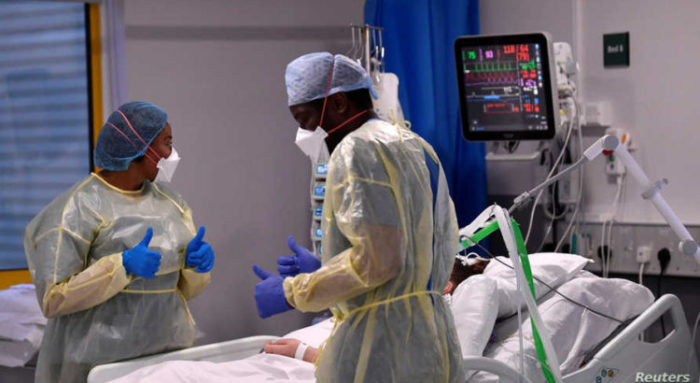 FILE PHOTO: Medical staff treat seriously ill COVID-19 patients at Milton Keynes University Hospital, amid the spread of the coronavirus disease (COVID-19) pandemic, Milton Keynes